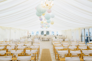 Marquee dressed with cream linings and chandeliers